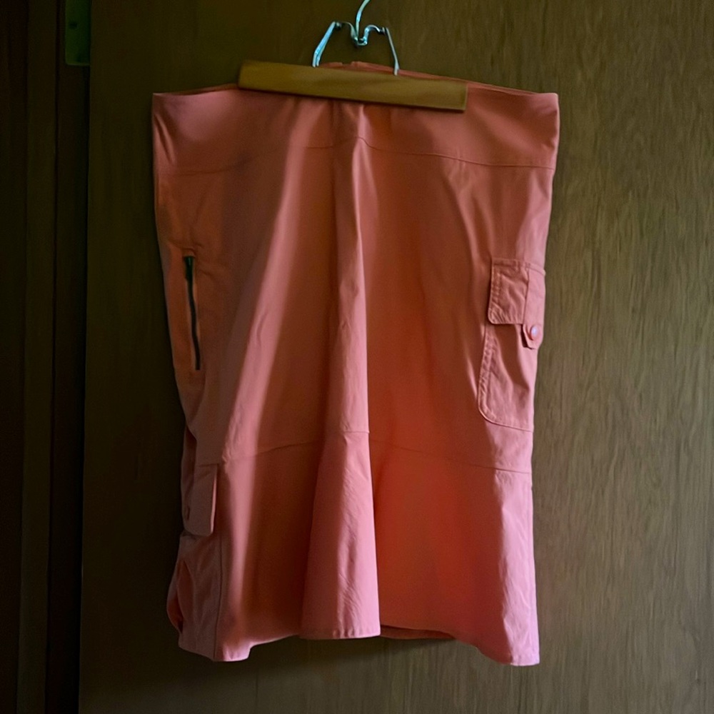 Cute and comfy! Stretchy, peach, flared hem skirt.